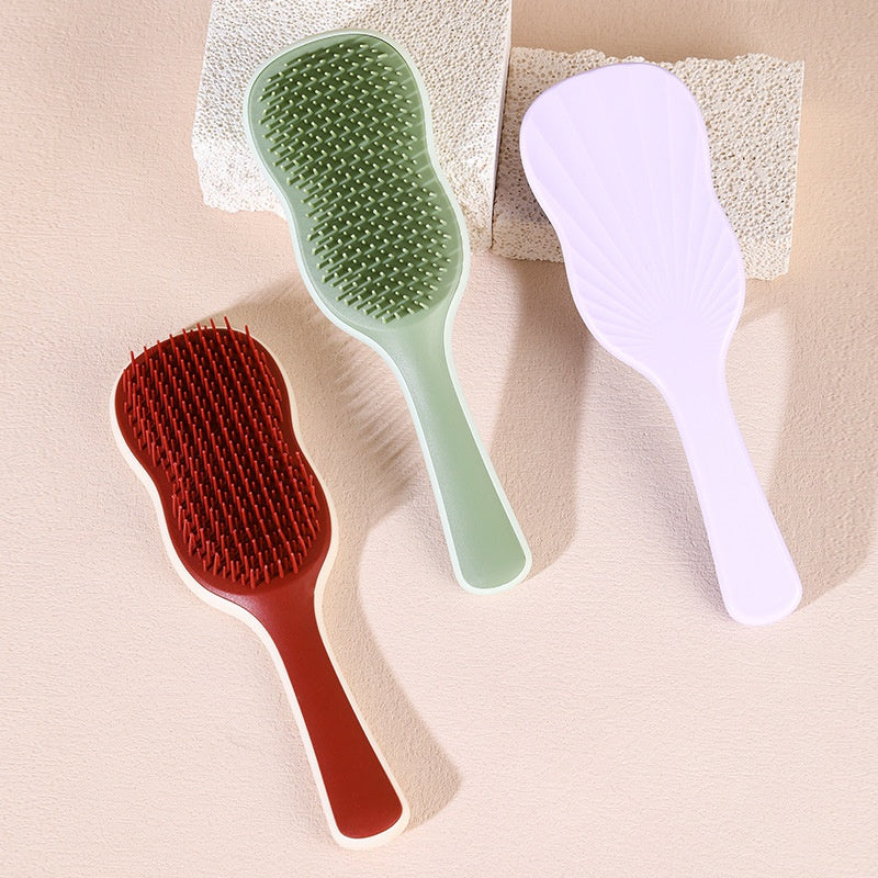 Banana Leaf‑Shaped Adjustable Grooming Comb for Pets